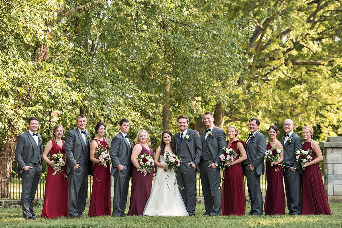 Kentucky Bourbon inspired wedding in Bowling Green KY at Historic Potter Farm featuring a maroon, navy & cream color palatte, a Kappa Delta KD Bride and Pi Kappa Alpha PIKE groom