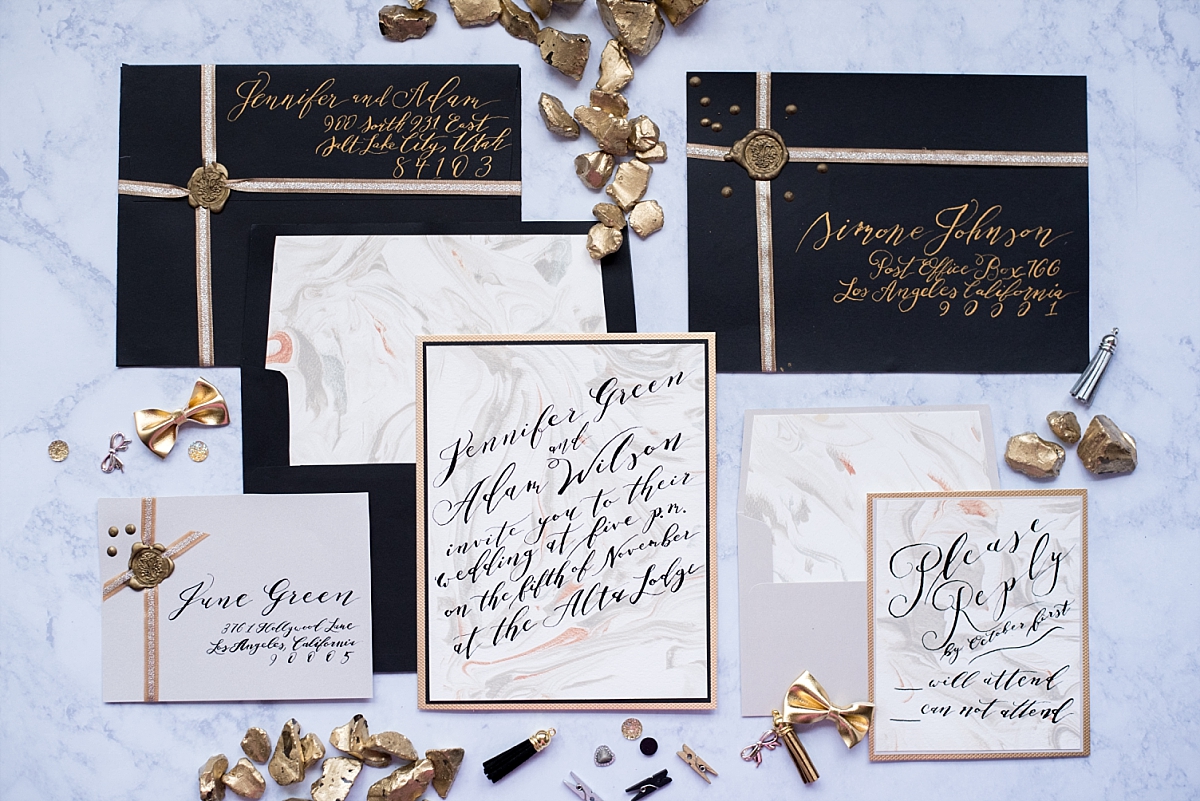 Elegant marbled paper with black and gold calligraphy