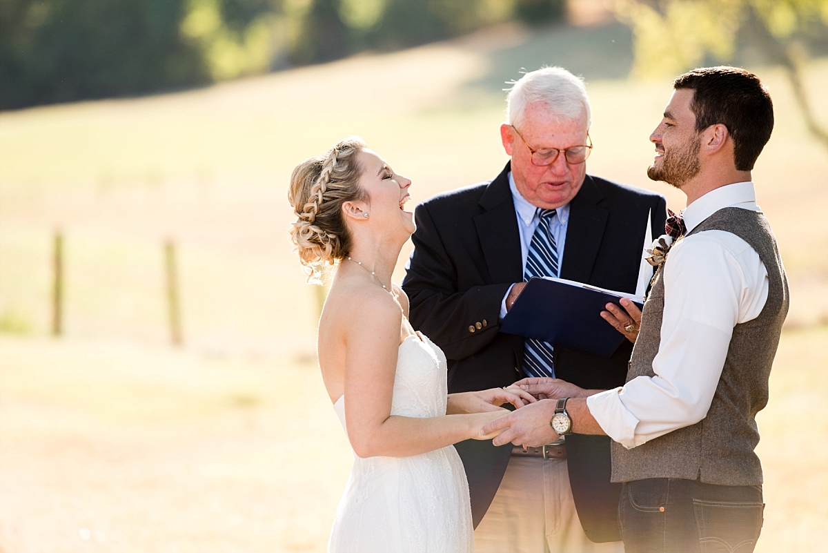 Joyful laughter between bride and groom during ceremony