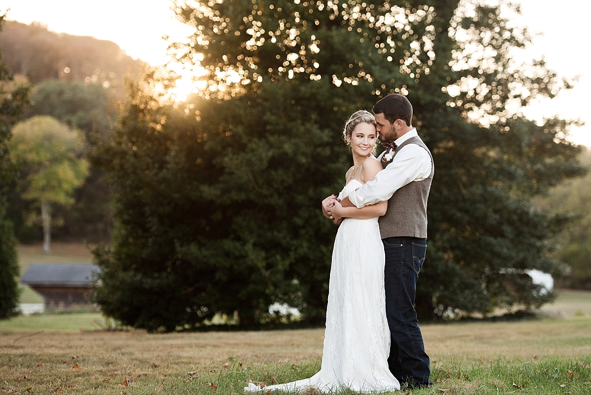 Sweet sunset photos of bride and groom on front lawn of Samry Plantation