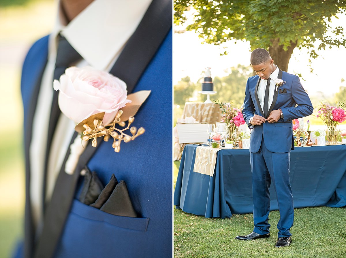 Navy suit with black pocket square and light pink rose