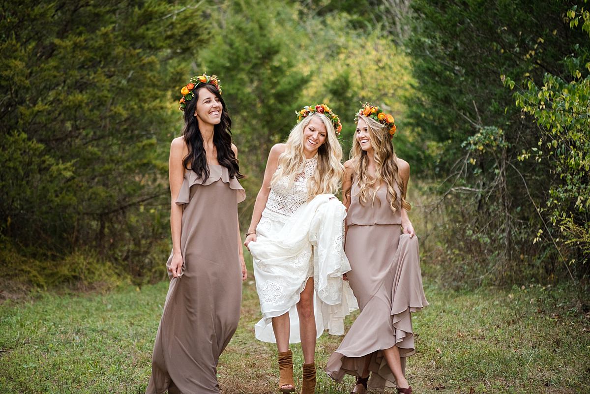 Bohemian wedding bridal style, walking through Cedarwood Weddings with bridesmaids