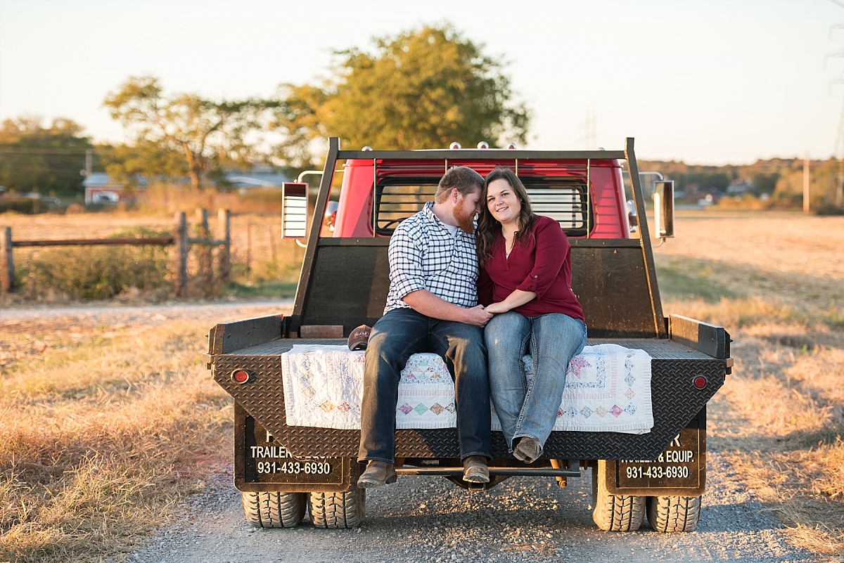 Vintage red truck on a country road for engagement photos