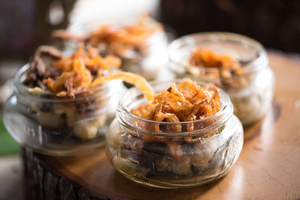 Cute miniature mason jars filled with southern comfort food